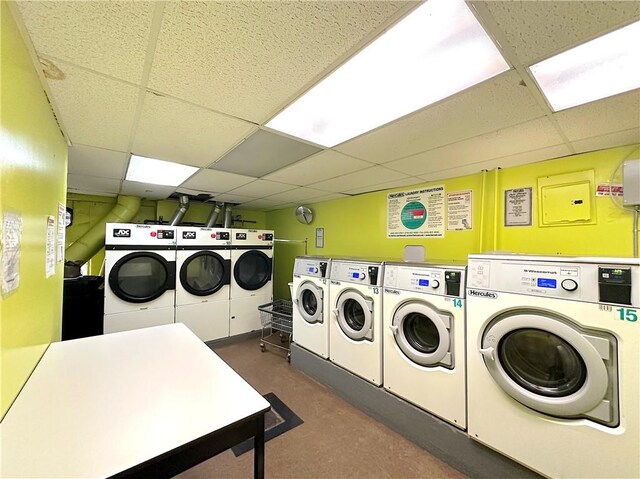 laundry area with washing machine and clothes dryer