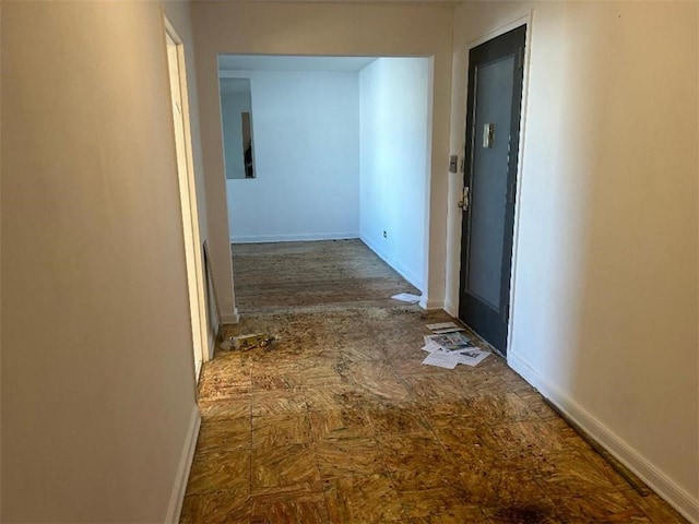 corridor with baseboards