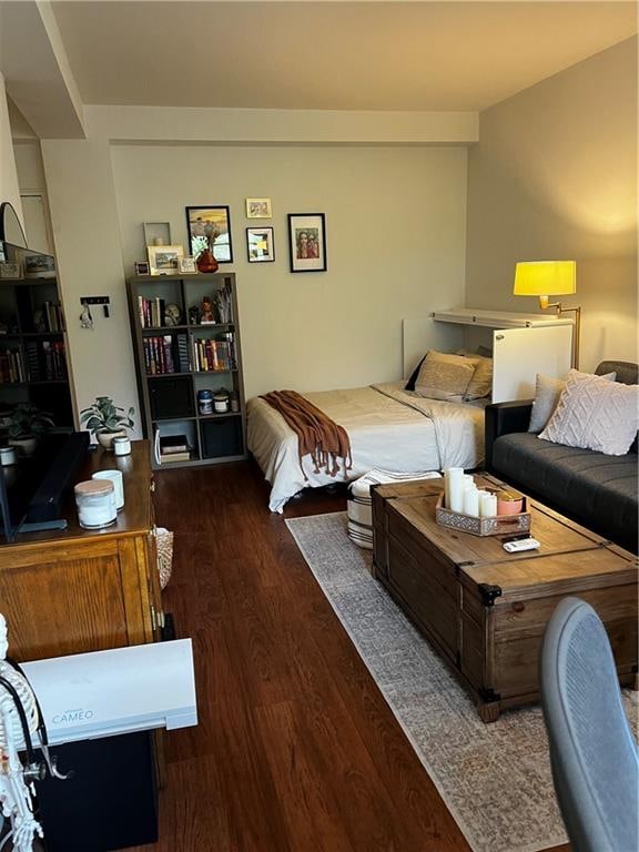 bedroom featuring dark hardwood / wood-style floors