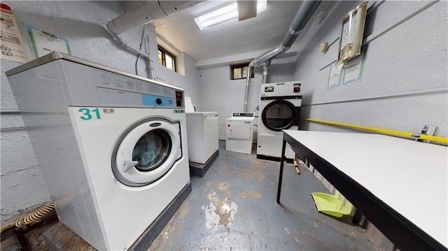 common laundry area with washer and dryer