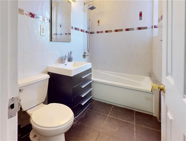 1934 Haring St, Brooklyn, NY 11229 - full bathroom featuring tile patterned flooring, vanity, toilet, tile walls, and washtub / shower combination