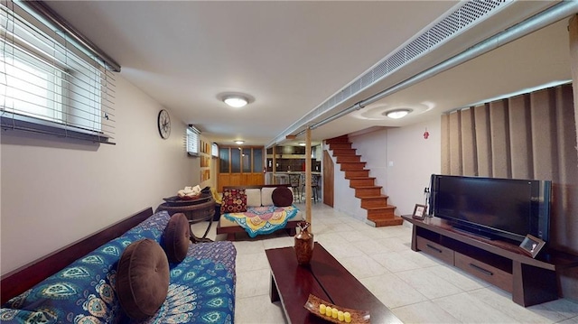 living room featuring light tile patterned floors