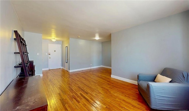 1934 Haring St, Brooklyn, NY 11229 - sitting room featuring wood-type flooring and baseboards