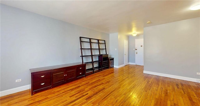 1934 Haring St, Brooklyn, NY 11229 - empty room with baseboards and light wood finished floors
