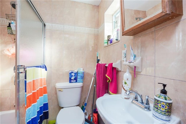 bathroom featuring decorative backsplash, tile walls, and toilet