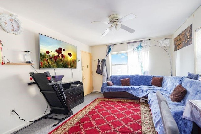 carpeted living room featuring ceiling fan