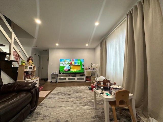 interior space featuring stairway, recessed lighting, and wood finished floors