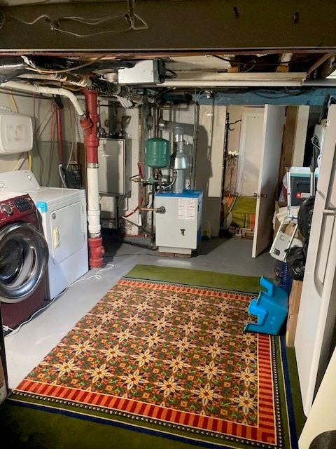 basement featuring washing machine and dryer