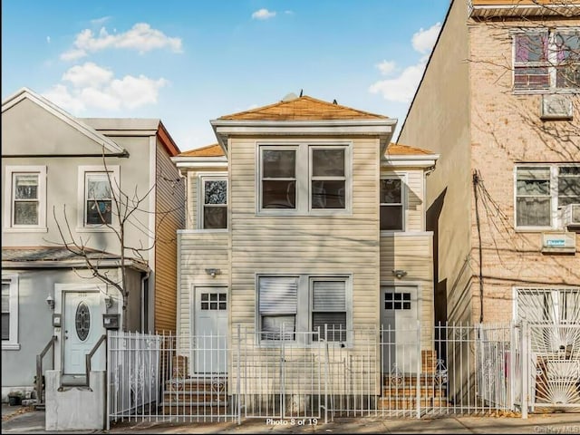 view of property featuring a fenced front yard