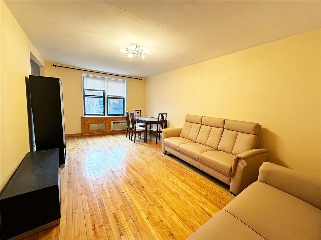 1213 Z Ave Unit E2, Brooklyn, NY 11235 - living room featuring hardwood / wood-style floors