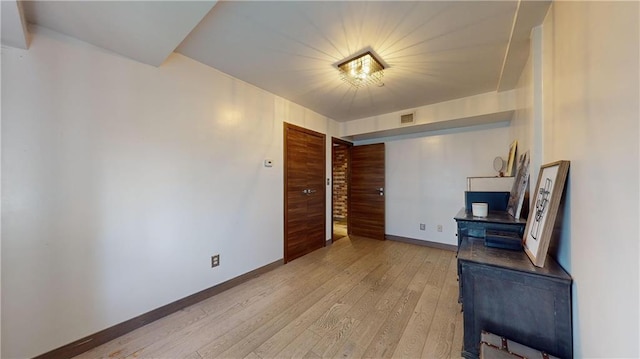 living room with light hardwood / wood-style flooring