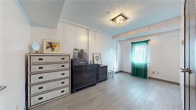 bedroom with light hardwood / wood-style flooring