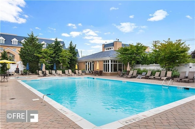 view of pool featuring a patio