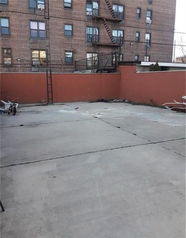 2530 Coney Island Ave, Brooklyn, NY 11223 - view of patio / terrace featuring fence