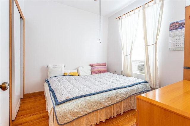 bedroom featuring light wood-type flooring