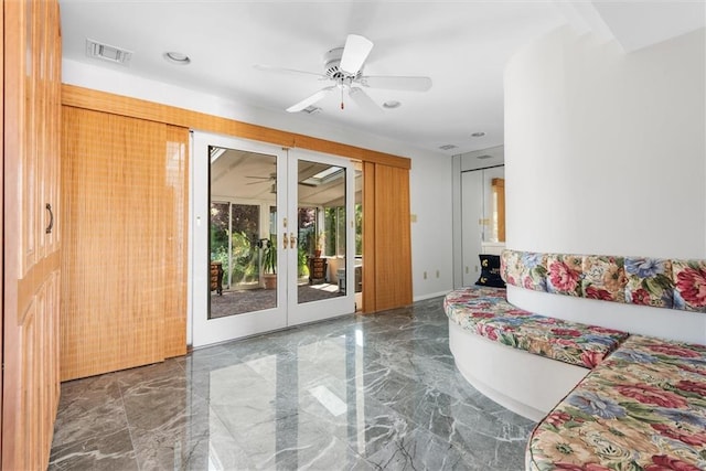 2729 Shore Dr, Merrick, NY 11566 - living room with ceiling fan, visible vents, french doors, and marble finish floor