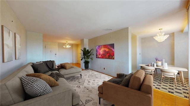 living area featuring a chandelier