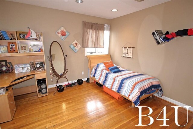 bedroom featuring light wood-type flooring