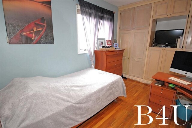 bedroom featuring light hardwood / wood-style floors