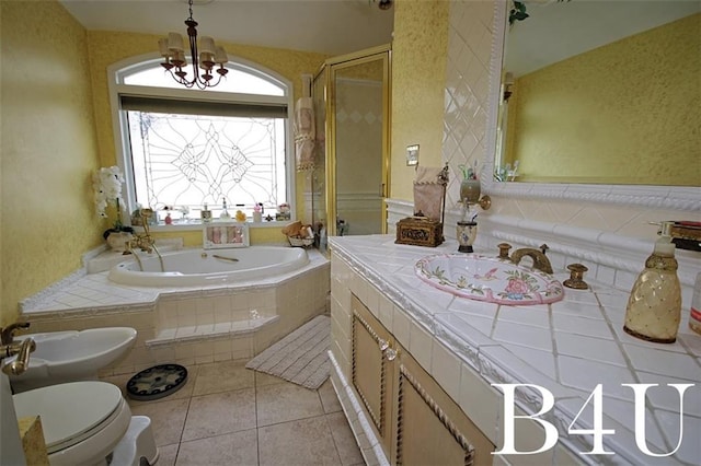 full bathroom with toilet, separate shower and tub, tile patterned floors, a bidet, and vanity