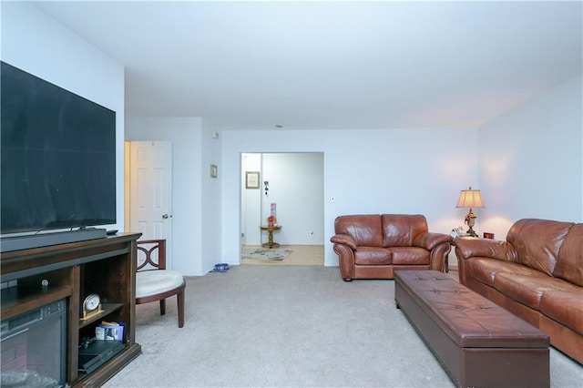 living room featuring light carpet