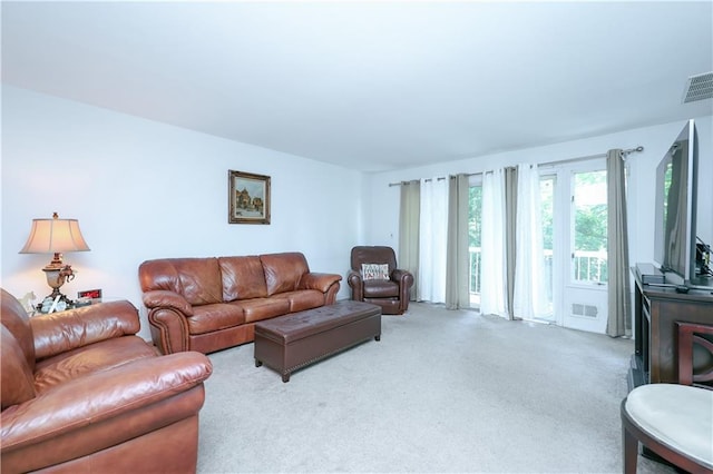 living room with light colored carpet