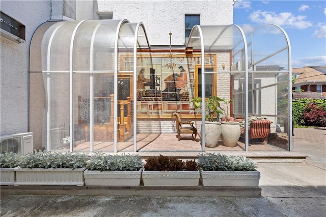 view of patio featuring ac unit