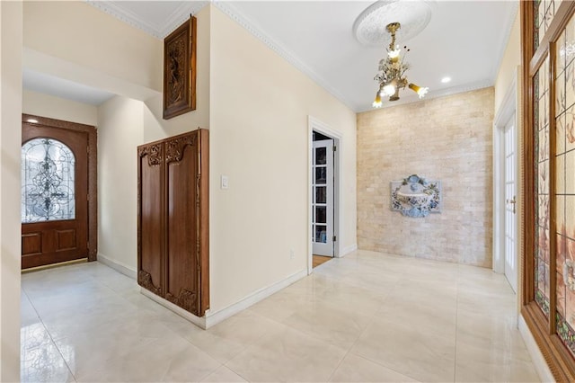 interior space featuring crown molding and a chandelier