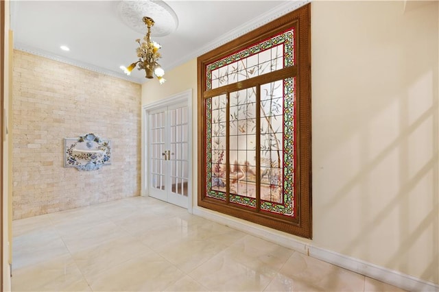 interior space with french doors, ornamental molding, and a notable chandelier