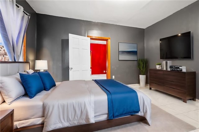 bedroom with light tile patterned flooring