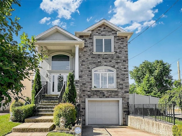 view of front of home with a garage