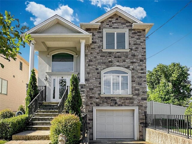 view of front of home featuring a garage