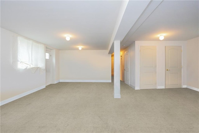 basement with light colored carpet