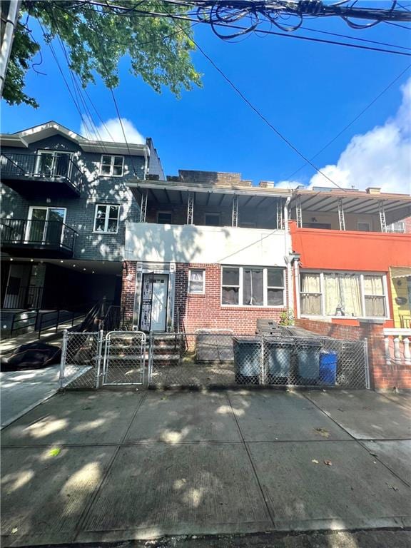1708 E 54th St, Brooklyn, NY 11234 - view of front of house with a gate and brick siding