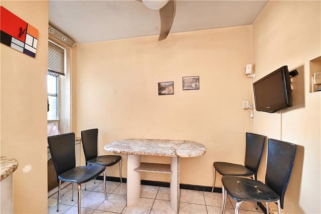 dining space with light tile patterned floors