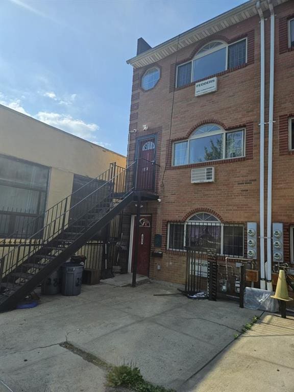 view of building exterior featuring stairway