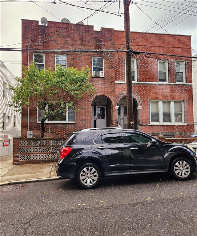 multi unit property featuring brick siding