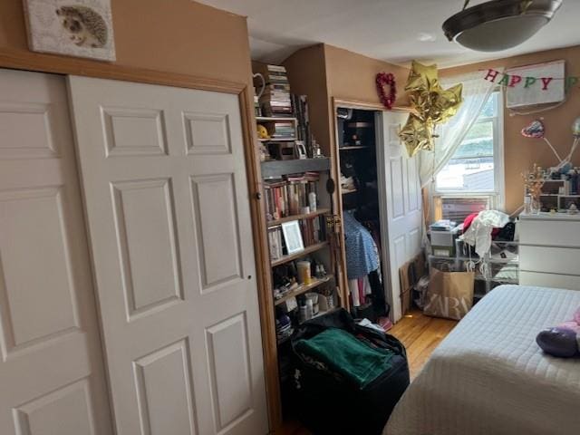 bedroom featuring hardwood / wood-style flooring