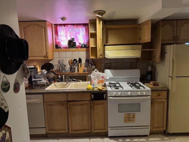 kitchen featuring decorative backsplash, sink, white appliances, and light tile patterned floors