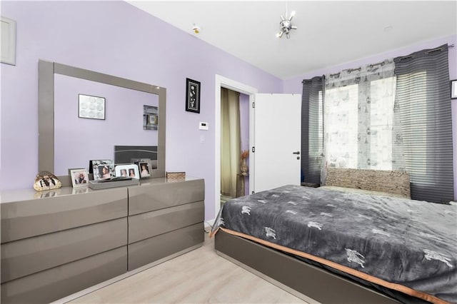 bedroom featuring light hardwood / wood-style flooring