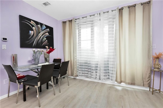 dining room featuring light hardwood / wood-style floors