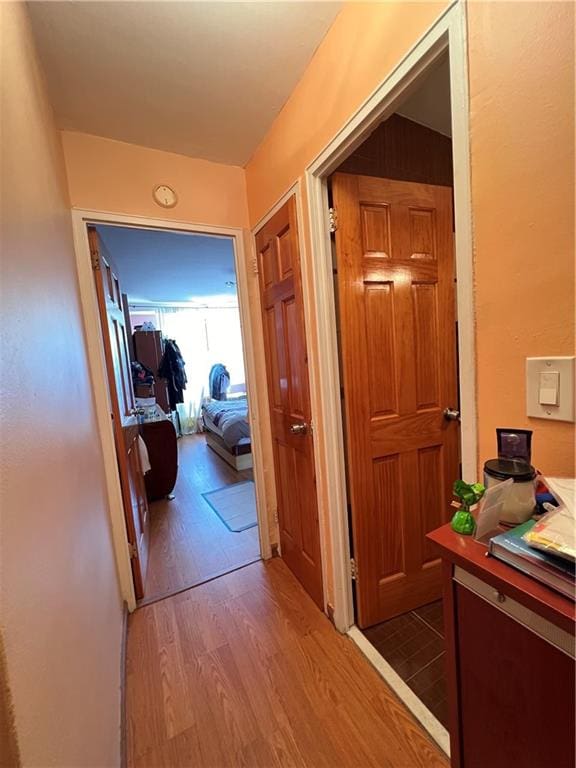 corridor featuring hardwood / wood-style flooring