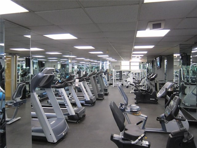 gym with a drop ceiling