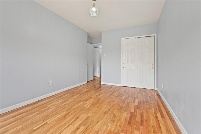 1021 E 87th St Unit 6B, Kings, NY 11236 - unfurnished bedroom featuring light wood-type flooring, baseboards, and a closet