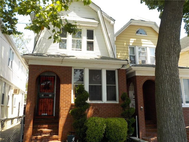 view of front of home with brick siding