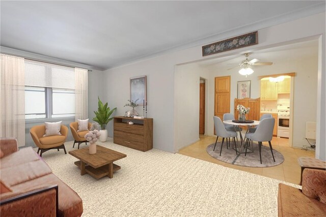 living room featuring ceiling fan and light tile patterned floors