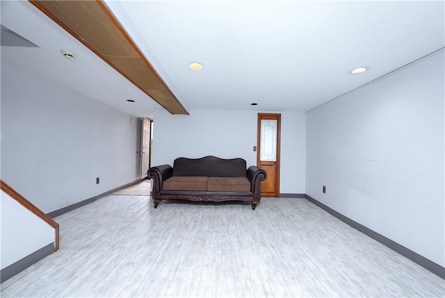 sitting room with recessed lighting, baseboards, and light wood finished floors