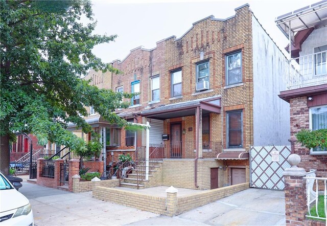 multi unit property featuring brick siding