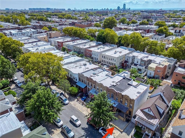 birds eye view of property featuring a view of city