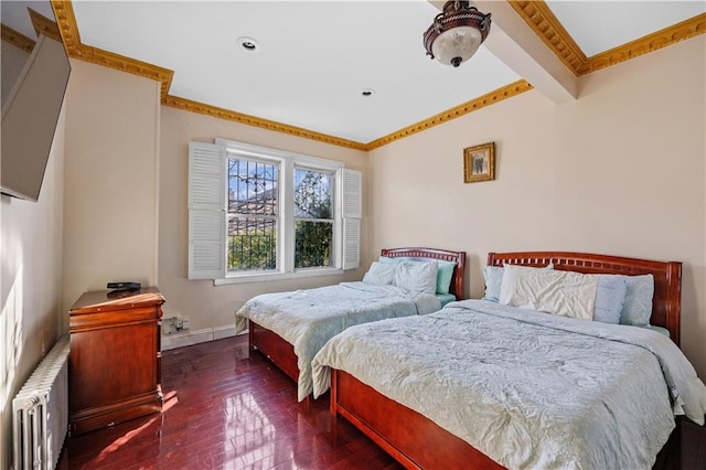 bedroom featuring baseboards, dark wood finished floors, beam ceiling, and radiator